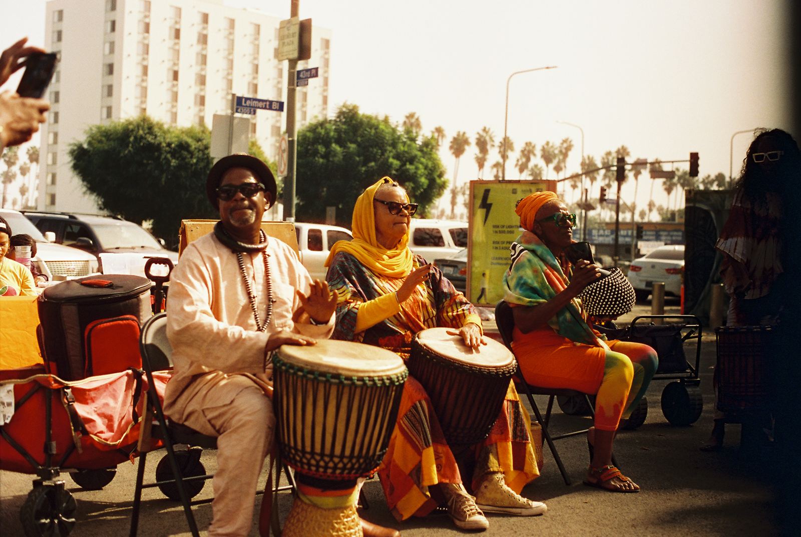 Drummers and neighbors gathered at People Street Plaza